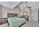 A comfortable main bedroom that offers a spacious interior and comforting decor at 373 Hidden Creek Ln, Canton, GA 30114