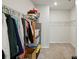 Walk in closet featuring wire rack shelving, carpeted floors, and ample storage at 375 Crider Ct, Woodstock, GA 30188