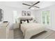 Relaxing bedroom with neutral tones, two bedside tables and lots of natural light at 7470 Princeton Trce, Sandy Springs, GA 30328