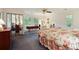 Bedroom features large windows, patterned bedding and classic furnishings at 7470 Princeton Trce, Sandy Springs, GA 30328
