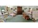 Spacious primary bedroom with vintage furnishings, large windows, and ample natural light at 7470 Princeton Trce, Sandy Springs, GA 30328