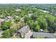 Bird's eye view of modern townhomes in a lively area, featuring a cell tower nearby at 1561 Mosaic Way, Smyrna, GA 30080