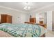 Bedroom features a sled bed, closet, and ensuite bathroom with neutral colors at 1561 Mosaic Way, Smyrna, GA 30080