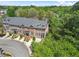Charming brick townhomes with well-manicured front yards and inviting entrances at 1561 Mosaic Way, Smyrna, GA 30080