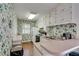 Cozy kitchen featuring a breakfast bar, white appliances, and ample cabinet storage at 1826 Bedfordshire Ct, Decatur, GA 30033