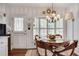 Eat in kitchen features a round table and wood chairs at 1826 Bedfordshire Ct, Decatur, GA 30033