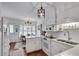Bright kitchen with white cabinets, updated appliances, eat in kitchen, and hardwood floors at 1826 Bedfordshire Ct, Decatur, GA 30033