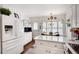 Bright eat-in kitchen with white cabinets and hardwood floors at 1826 Bedfordshire Ct, Decatur, GA 30033