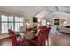 Open-concept living area with vaulted ceilings, fireplace, hardwood floors, and classic furnishings at 1826 Bedfordshire Ct, Decatur, GA 30033