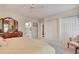 Spacious main bedroom featuring a comfortable bed, a closet, and an en-suite bathroom at 1826 Bedfordshire Ct, Decatur, GA 30033