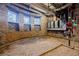 Unfinished basement with brick floor and walls at 3593 Hemphill St, Atlanta, GA 30337