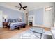 Light-filled bedroom with bay window, fireplace, and a decorative ceiling at 3593 Hemphill St, Atlanta, GA 30337