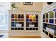 A close up view of a colorful stained glass built-in with shelving set in a traditional home at 3593 Hemphill St, Atlanta, GA 30337