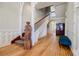 Elegant foyer with hardwood floors, stairs, and decorative woodwork create a welcoming entrance to this beautiful home at 3593 Hemphill St, Atlanta, GA 30337