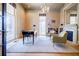 Bright office space with a fireplace, built-in shelving, and ample natural light, ideal for a home workspace at 3593 Hemphill St, Atlanta, GA 30337