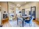 Well-lit office with custom desk, built-ins, hardwood floors, and elegant decor, creating a professional ambiance at 3593 Hemphill St, Atlanta, GA 30337