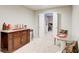Finished basement offers a bar area, table, and doorway to a separate bonus room at 2121 Silva Ct, Conley, GA 30288