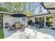Outdoor patio set with shade umbrella, perfect for relaxation and entertaining guests at 2590 Hawthorne Ne Pl, Atlanta, GA 30345