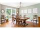 Dining room features a hardwood floor and a large window with lots of natural light at 2590 Hawthorne Ne Pl, Atlanta, GA 30345