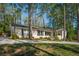 Charming brick home with manicured lawn and mature trees creating a welcoming curb appeal at 2590 Hawthorne Ne Pl, Atlanta, GA 30345