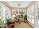 Bright sunroom with lots of natural light, multiple windows, and hardwood floors at 2590 Hawthorne Ne Pl, Atlanta, GA 30345
