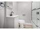 Modern bathroom with new fixtures, a glass shower and modern vanity at 2806 Chaucer Sw Dr, Atlanta, GA 30311