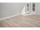 Bright bedroom with new flooring and two large windows at 2806 Chaucer Sw Dr, Atlanta, GA 30311