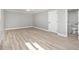 Bright bedroom with new floors and natural light from a window at 2806 Chaucer Sw Dr, Atlanta, GA 30311
