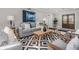 Comfortable living room featuring modern furniture, recessed lighting, and hardwood floors at 2806 Chaucer Sw Dr, Atlanta, GA 30311