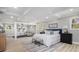 Spacious main bedroom featuring recessed lights, wood floors, and a sitting area at 2806 Chaucer Sw Dr, Atlanta, GA 30311