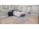 This main bedroom features hardwood flooring, neutral paint colors, and bright, natural light at 2806 Chaucer Sw Dr, Atlanta, GA 30311