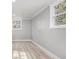 This living space is complete with neutral walls, hardwood floors, trim accents, and bright natural light at 2806 Chaucer Sw Dr, Atlanta, GA 30311
