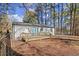 Backyard view with a deck and lots of trees at 3460 Fairlane Dr, Atlanta, GA 30331