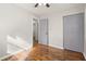 Bedroom with hardwood floors and a closet with gray doors at 3460 Fairlane Dr, Atlanta, GA 30331