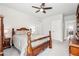 Relaxing bedroom with comfortable bed, ceiling fan, and warm neutral tones at 4025 Connolly Ct, Roswell, GA 30075
