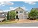 Beautiful, two-story home with a two-car garage and well-manicured lawn at 4025 Connolly Ct, Roswell, GA 30075