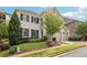 Elegant two-story home with a manicured lawn and attached two-car garage at 4025 Connolly Ct, Roswell, GA 30075