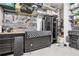 Well-organized garage featuring work bench, tool racks, and epoxy flooring for a functional workspace at 4025 Connolly Ct, Roswell, GA 30075