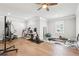 Well-equipped home gym with modern exercise equipment and hardwood flooring at 4025 Connolly Ct, Roswell, GA 30075