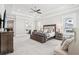 Luxurious main bedroom suite featuring a spa-like bathroom, sitting area, and ample natural light at 4025 Connolly Ct, Roswell, GA 30075
