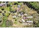 Aerial view of the property featuring the pool, workshop, chicken coop, pole barn, and home at 700 Stewart Rd, Covington, GA 30016
