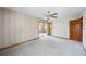 Bedroom with ceiling fan and doorways to other rooms at 700 Stewart Rd, Covington, GA 30016