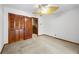 Bedroom with closet and doorway to stairs at 700 Stewart Rd, Covington, GA 30016