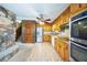Eat-in kitchen featuring stainless steel appliances and plentiful cabinet space at 700 Stewart Rd, Covington, GA 30016
