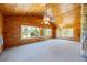 Large living room area with natural wood features and scenic views at 700 Stewart Rd, Covington, GA 30016