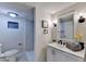 Modern bathroom with a new vanity, mirror, and a stylish, tiled shower at 21 W Lake Dr, Oxford, GA 30054