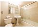 Cozy tiled bathroom featuring a pedestal sink and shower-tub combo at 2285 Peachtree Ne Rd # 604, Atlanta, GA 30309