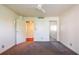 Cozy bedroom featuring carpeted floors, neutral walls, a ceiling fan, and closet with sliding doors at 2285 Peachtree Ne Rd # 604, Atlanta, GA 30309