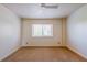 This carpeted bedroom features natural light with a ceiling fan and neutral walls at 2285 Peachtree Ne Rd # 604, Atlanta, GA 30309