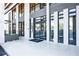 Modern building entrance with sleek black frames and glass doors at 2285 Peachtree Ne Rd # 604, Atlanta, GA 30309